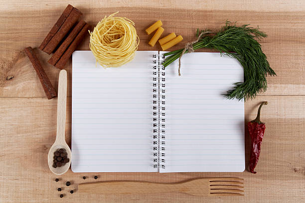 istock Baking ingredients for cooking and notebook for recipes. 476750560