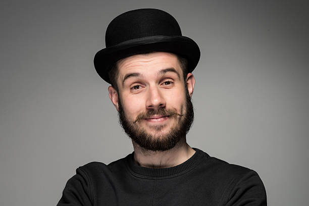 istock portrait of handsome young smiling man 476750692