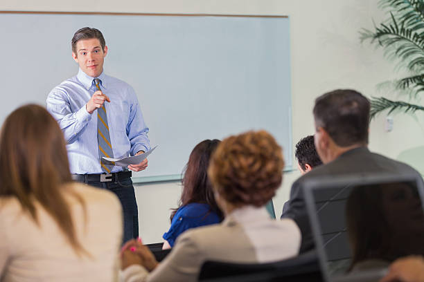 istock Speaker answering questions during motivational business conference seminar 476752208