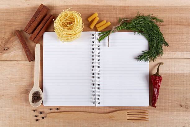 istock Baking ingredients for cooking and notebook for recipes. 476752268