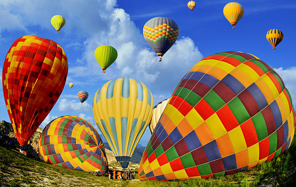 istock Colorful hot air balloons against blue sky 476753300