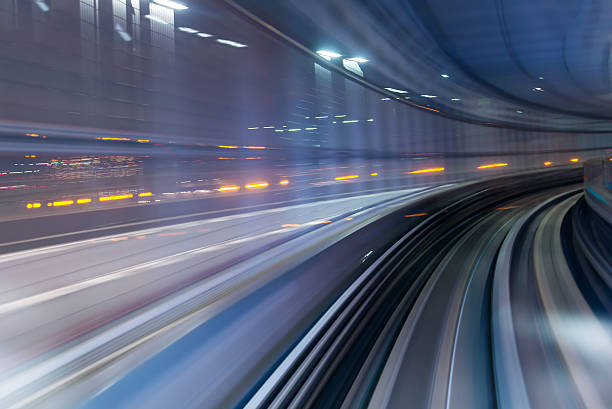 Subway tunnel with Motion blur of a city from inside stock photo