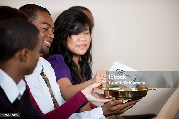 Tithe And Offering Stock Photo - Download Image Now - 2015, Adult, African Ethnicity