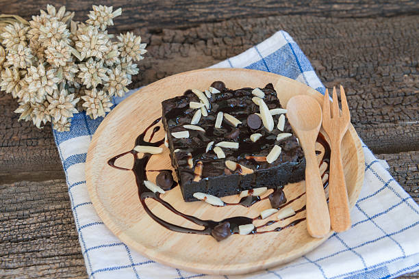 istock brownie on wood plate 476757720