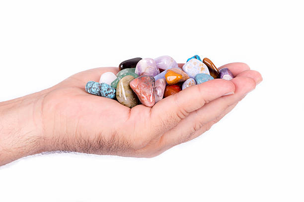istock Hand cupped full of precious stones 476757958