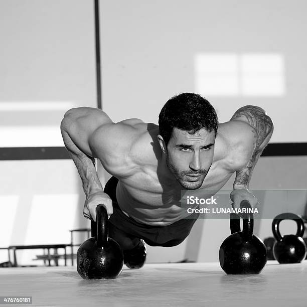 Gym Man Pushup Strength Pushup With Kettlebell Stock Photo - Download Image Now - 20-29 Years, Active Lifestyle, Activity