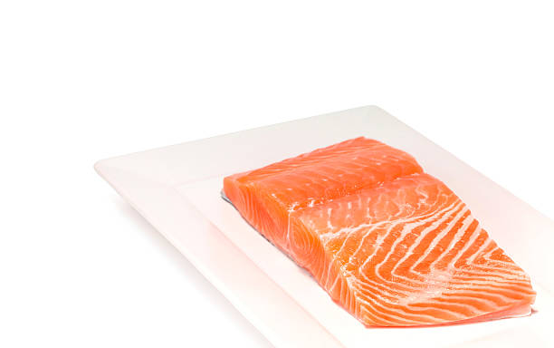 istock salmon fish fresh meat slice isolated on white background 476761428