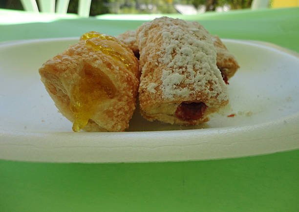 Puertorrican Pastries Puertorrican pastries. Made from puff pastry and filled with pineapple and guava topped with sugar. Baked and served hot in parties and other special occasions, their ingredients denote the quality of the tropical culture that is Puerto Rico.  puerto rican culture stock pictures, royalty-free photos & images