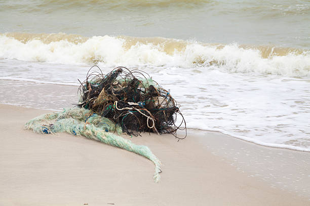 istock Tangled fishing nets on the beach 476763636