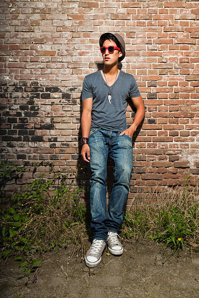 istock Urban asian man with red sunglasses. Good looking. Cool guy. 476767103