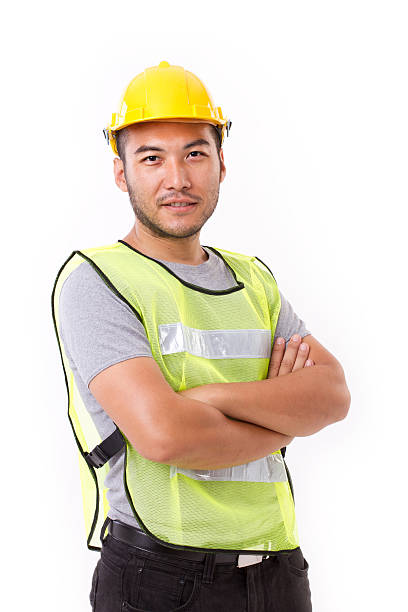 istock confident, strong construction worker crossing his arms on white 476767588