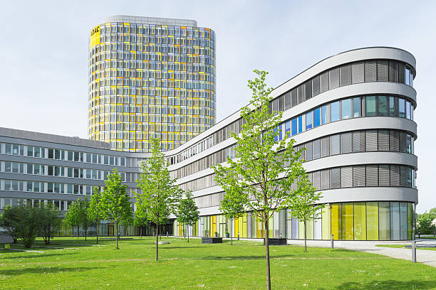 Headquarters ADAC club European automobile association Munich, Germany - May 12, 2015: ADAC club is an automobile association for emergency medical assistance and technical repair services on European roads. This new office building and modern headquarters in Munich. adac stock pictures, royalty-free photos & images