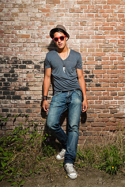 istock Urban asian man with red sunglasses. Good looking. Cool guy. 476769049