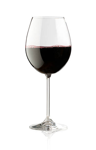 WINE GLASS elegant and expensive red glass wine for mounting graphic design merlot grape photos stock pictures, royalty-free photos & images