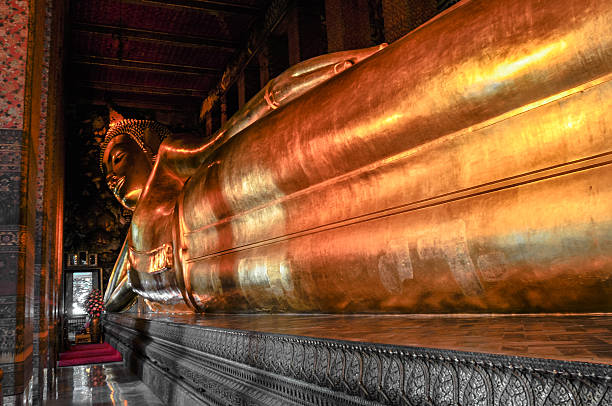 istock Buddha gold statue face. Wat Pho, Bangkok, Thailand 476769677