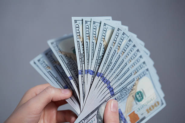 istock Money in female hands 476772320