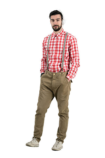 istock Cool relaxed hipster dj wearing headphones in one ear 476772402