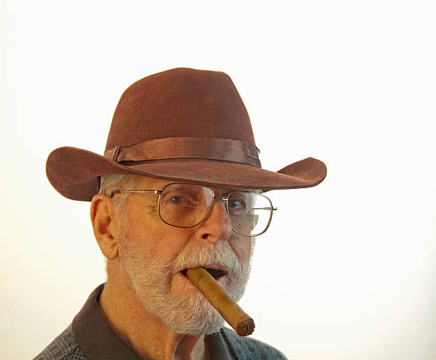 istock Senior Male With Cigar 476778239