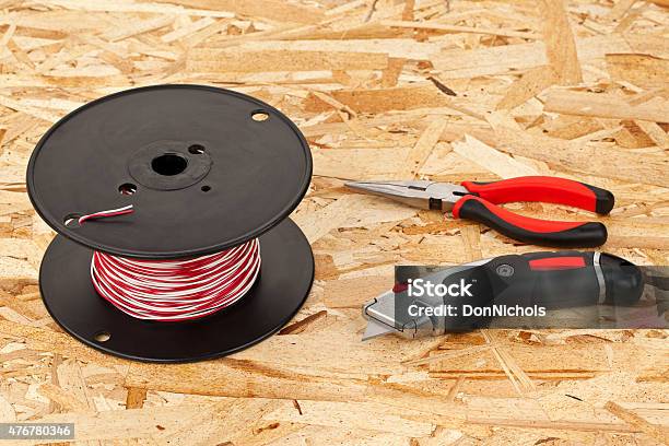 Spool Of Wire And Hand Tools Stock Photo - Download Image Now - 2015, Cable, Electricity