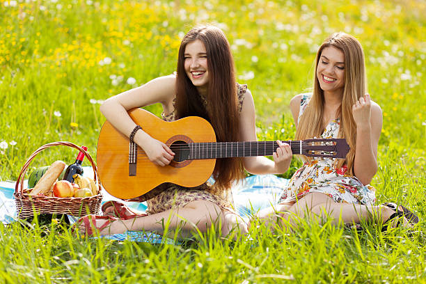 istock Two beautiful young women on a picnic 476780530