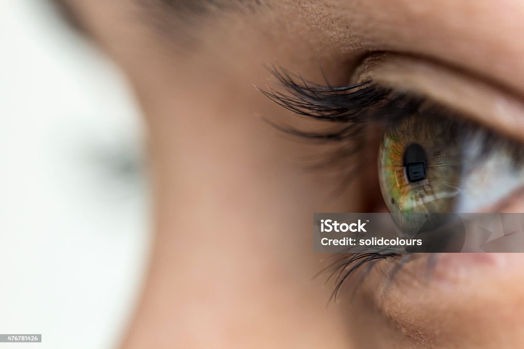 Human Eye Close-up human eye looking forward. 2015 Stock Photo
