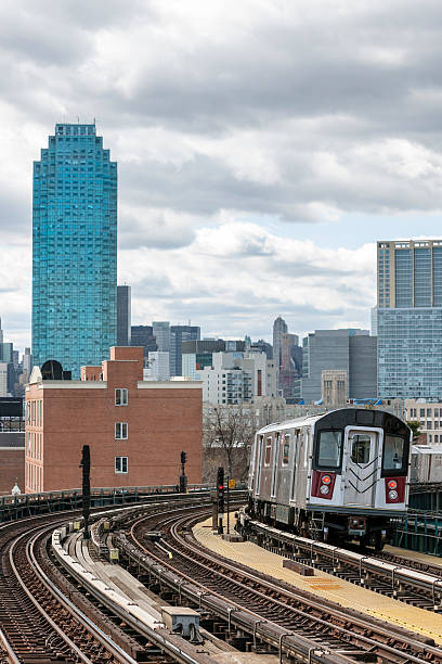 istock Subway Train Speeding on Elevated Track in Queens, New York 476781612