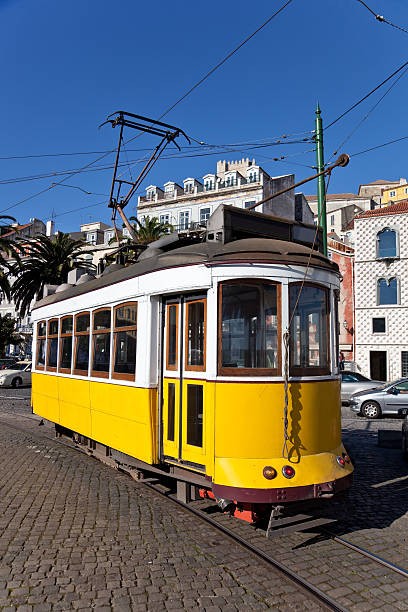 istock Iconic 100 year old Lisbon yellow tram 476787045