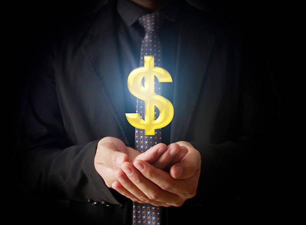 istock Man touching online button with money icon 476787126