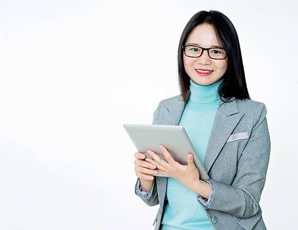 istock Young businesswoman with digital tablet 476789944