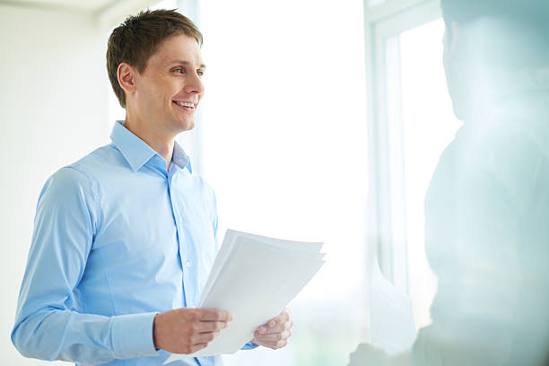 istock Manager listening to colleague 476790594