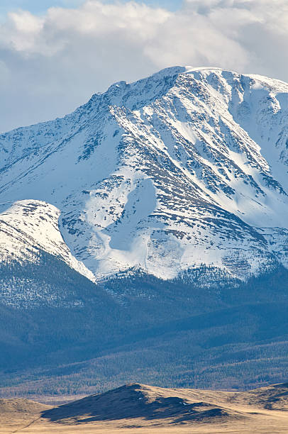 istock Mountains covered with snow and fog 476795854