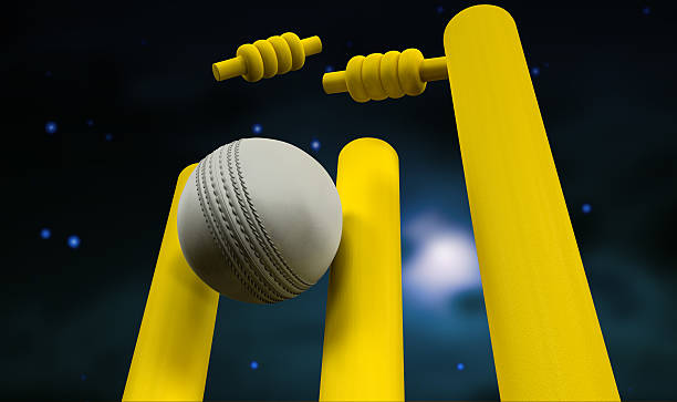 istock Cricket Ball Hitting Wickets Night 476797617