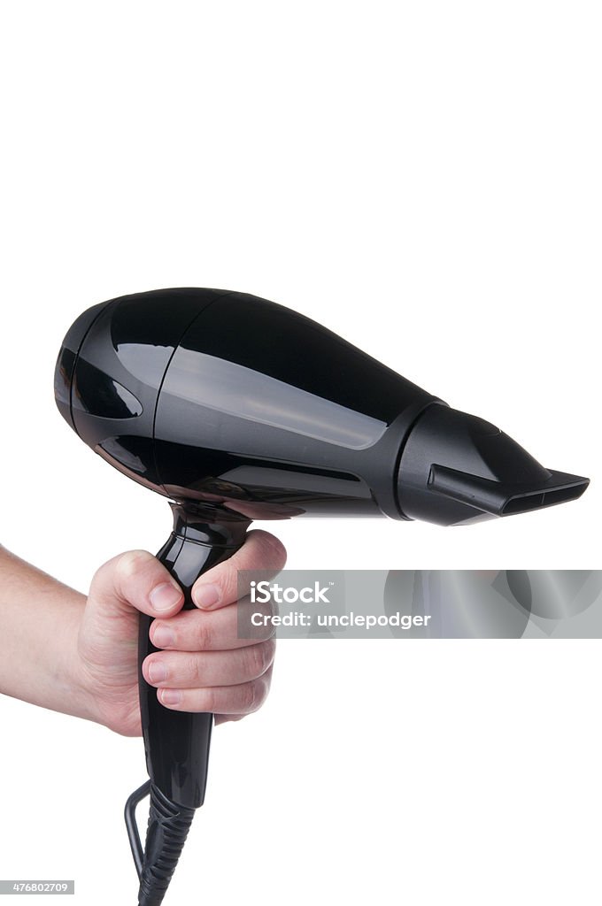 Mano agarrando secador de cabello - Foto de stock de Botón - Mercería libre de derechos
