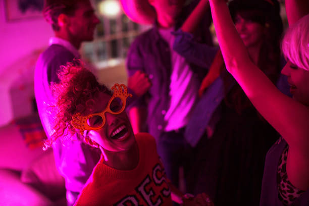 istock Friends dancing together at party 476806013