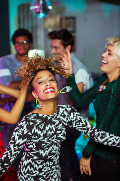 istock Friends dancing together at party 476806085
