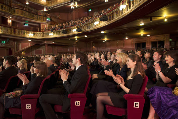 istock Audience applauding in theater 476806531