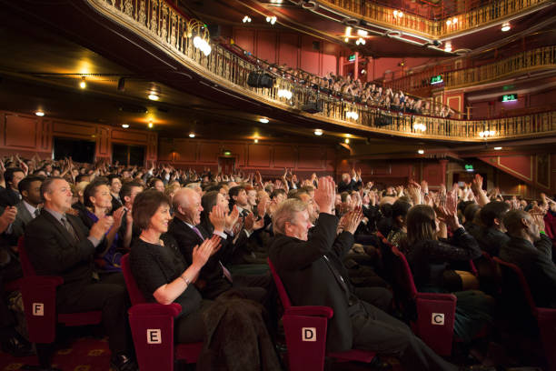 istock Audience applauding in theater 476806541