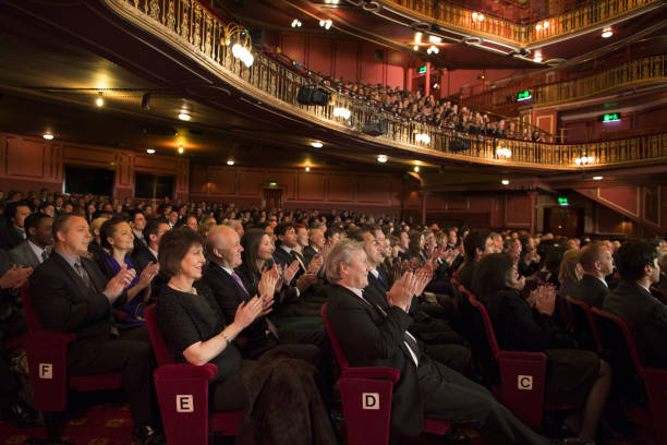 istock Audience applauding in theater 476806549