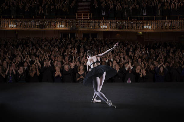 istock Ballerina bowing on stage in theater 476806605