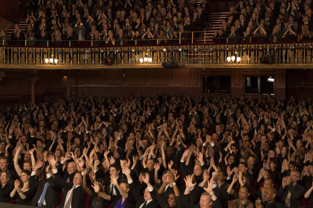 istock Audience cheering in theater 476806635