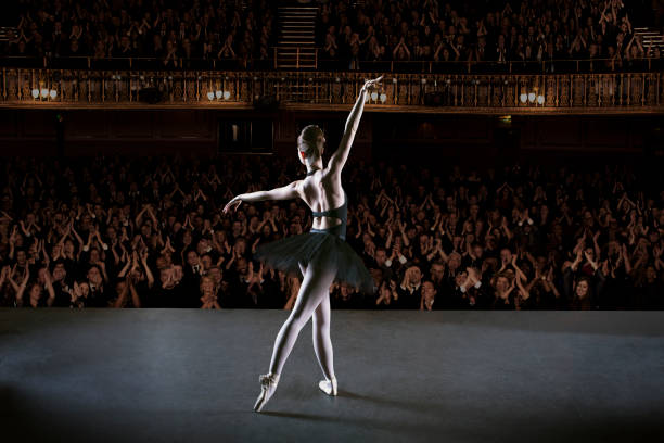 ballerina performing on stage in theater - theatrical performance ballet stage theater dancing imagens e fotografias de stock