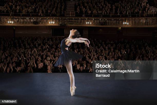 Ballerina Performing On Stage In Theater Stock Photo - Download Image Now - Ballet, Audience, Dancing