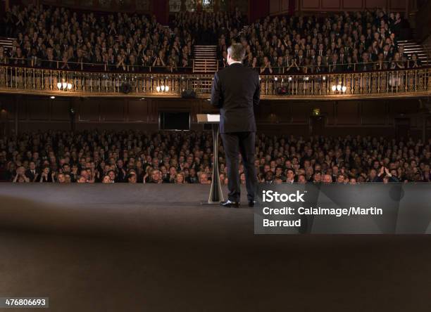 Performer On Stage In Theater Stock Photo - Download Image Now - Public Speaker, Stage - Performance Space, Audience