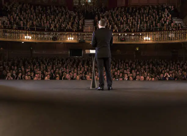 Photo of Performer on stage in theater