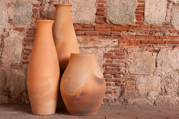 istock Set of three hand-made clay pots 476809012