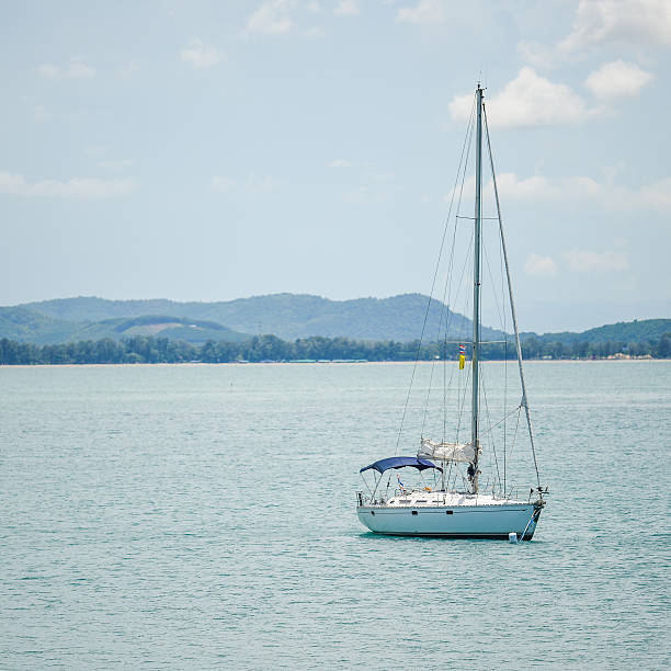 istock Sailing boat in open blue sea 476811998