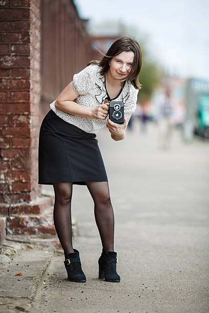 istock Woman photographer 476812906