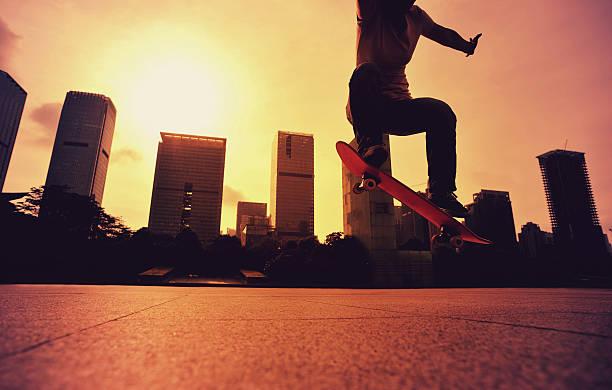 istock skateboarder doing skateboarding trick ollie on city 476813012