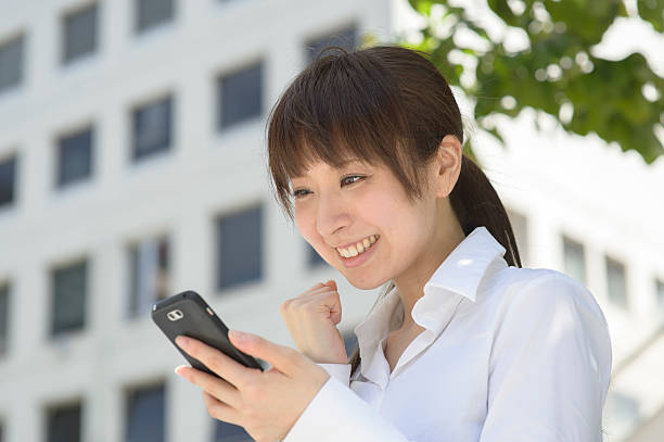 istock Young women joy to see the smartphone 476813208