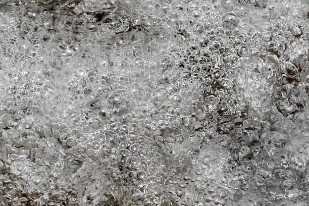 istock close up air bubble water fall nature background 476813538